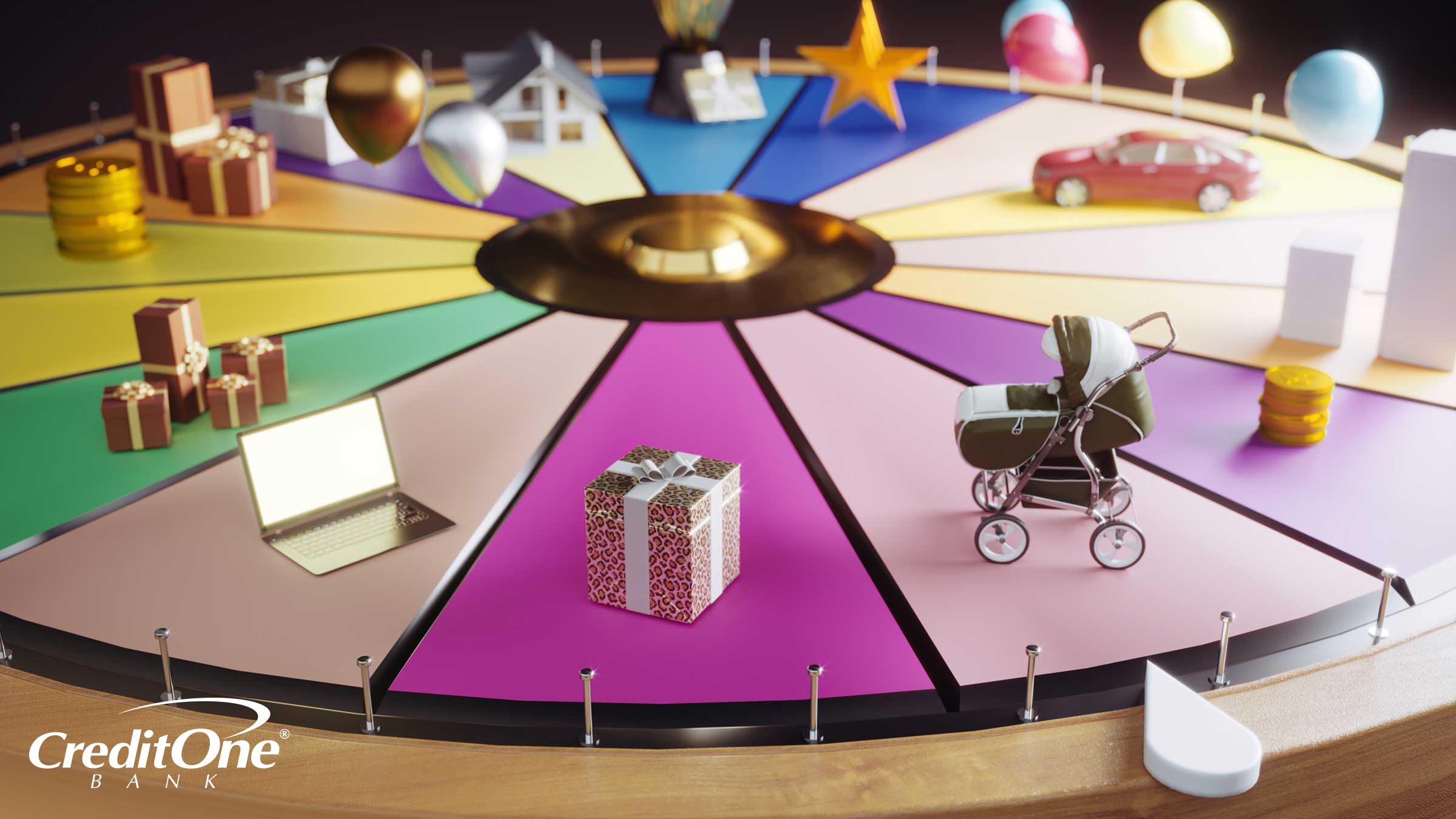 A colorful roulette wheel has miniature models on the section wedges, including gifts, a laptop, baby carriage, car, house and money. This represents the concept of how these life events may affect your credit and finances in unexpected ways, whether good or bad.